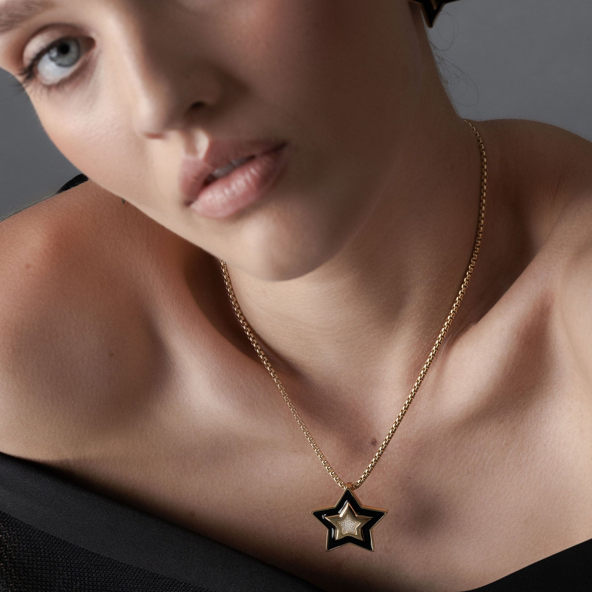 Supernova Star Pendant Necklace in 14k gold-plated stainless steel with Black Enamel and Clear Cubic Zirconias| Silk & Steel Jewellery