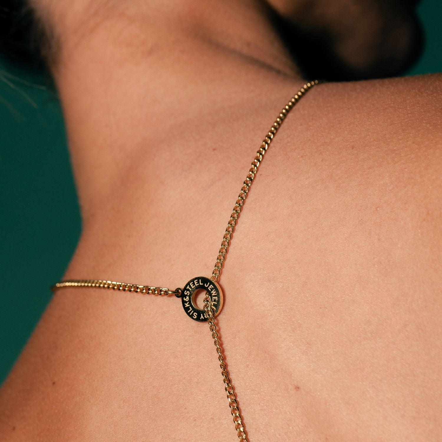 Silk & Steel Orbit Lariat necklace in 14k gold-plated stainless steel.