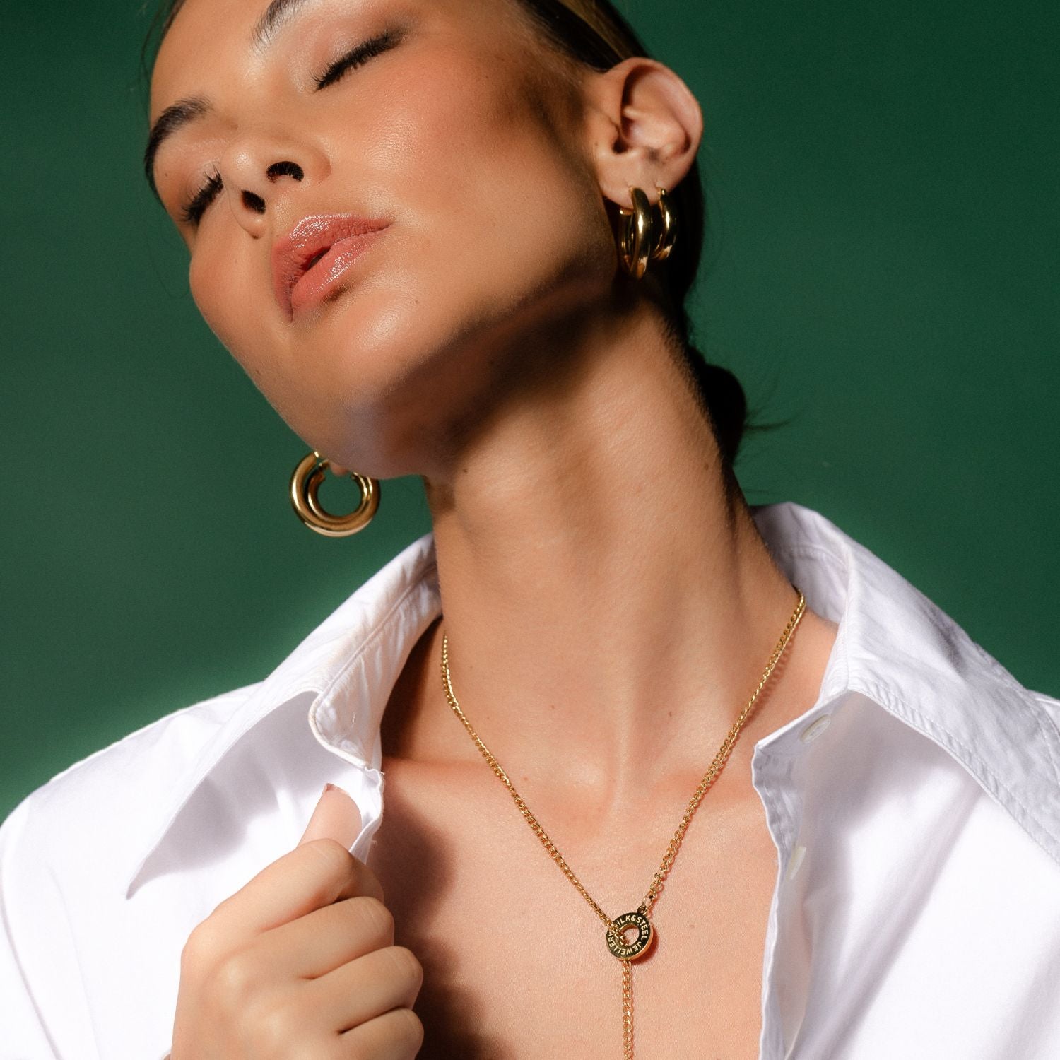 Silk & Steel large halo hoop earrings in 14k gold-plated stainless steel.