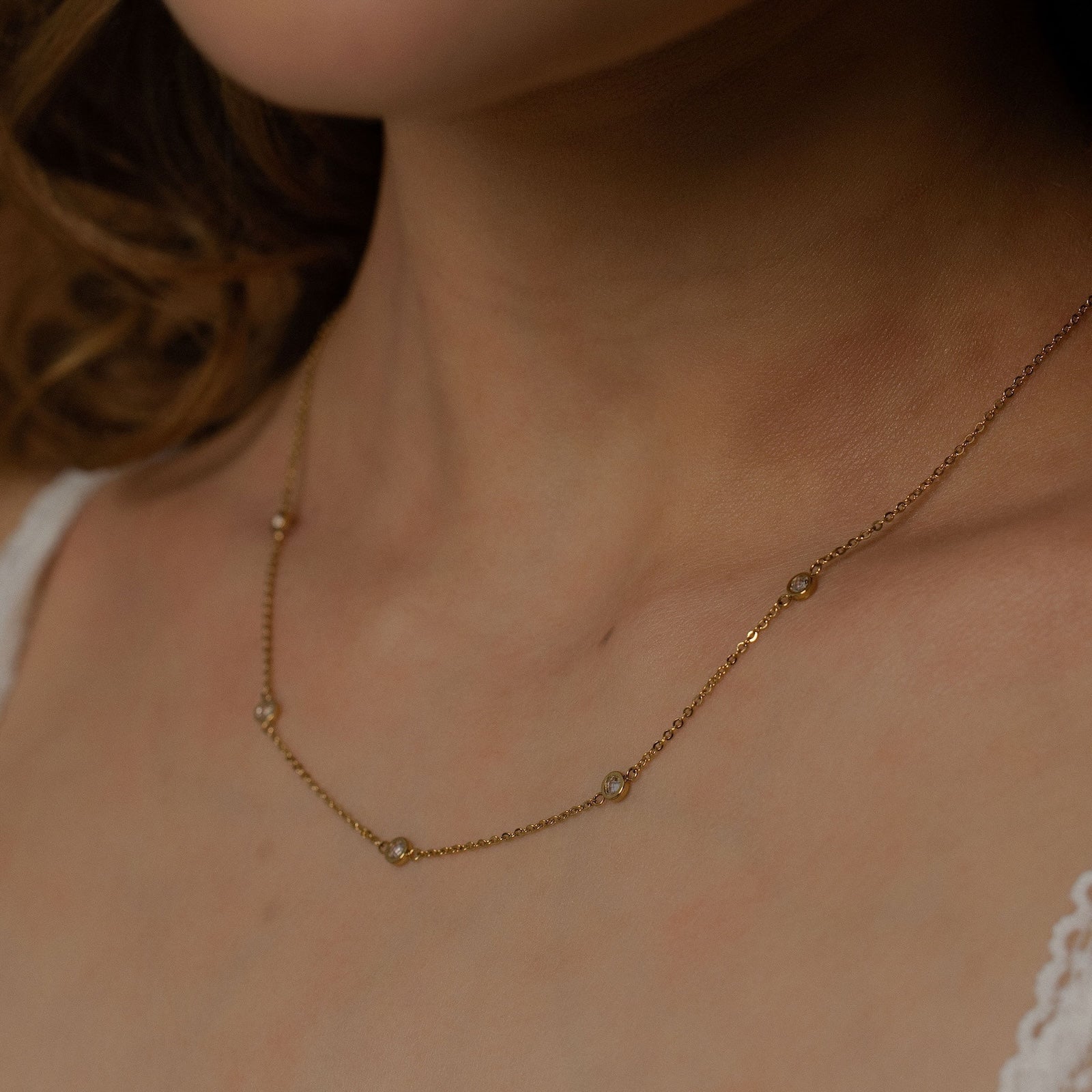 Silk & Steel Solstice Necklace in 14k gold-plated stainless steel with cubic zirconias.