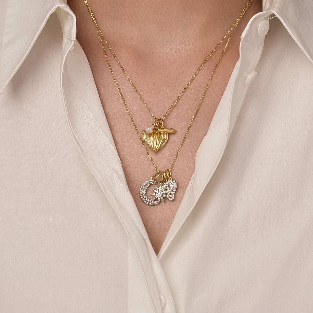 Silk & Steel Storyteller charms on fine cable chain in 14k gold-plated sterling silver with cubic zirconia.