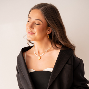 Pearl puffed heart necklace in 14k gold-plated stainless steel with freshwaters pearls and gold hematite beads.