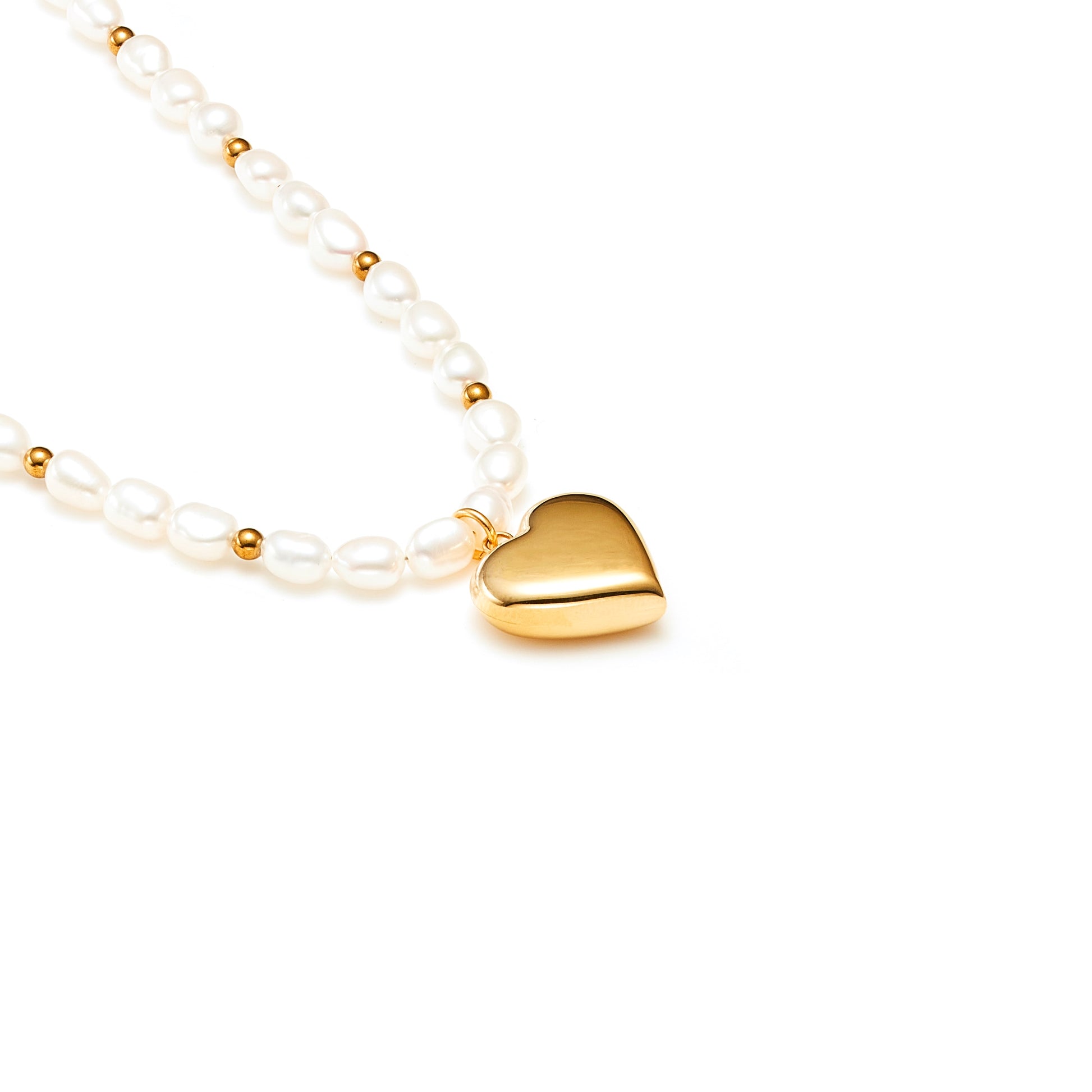 Pearl puffed heart necklace in 14k gold-plated stainless steel with freshwaters pearls and gold hematite beads.