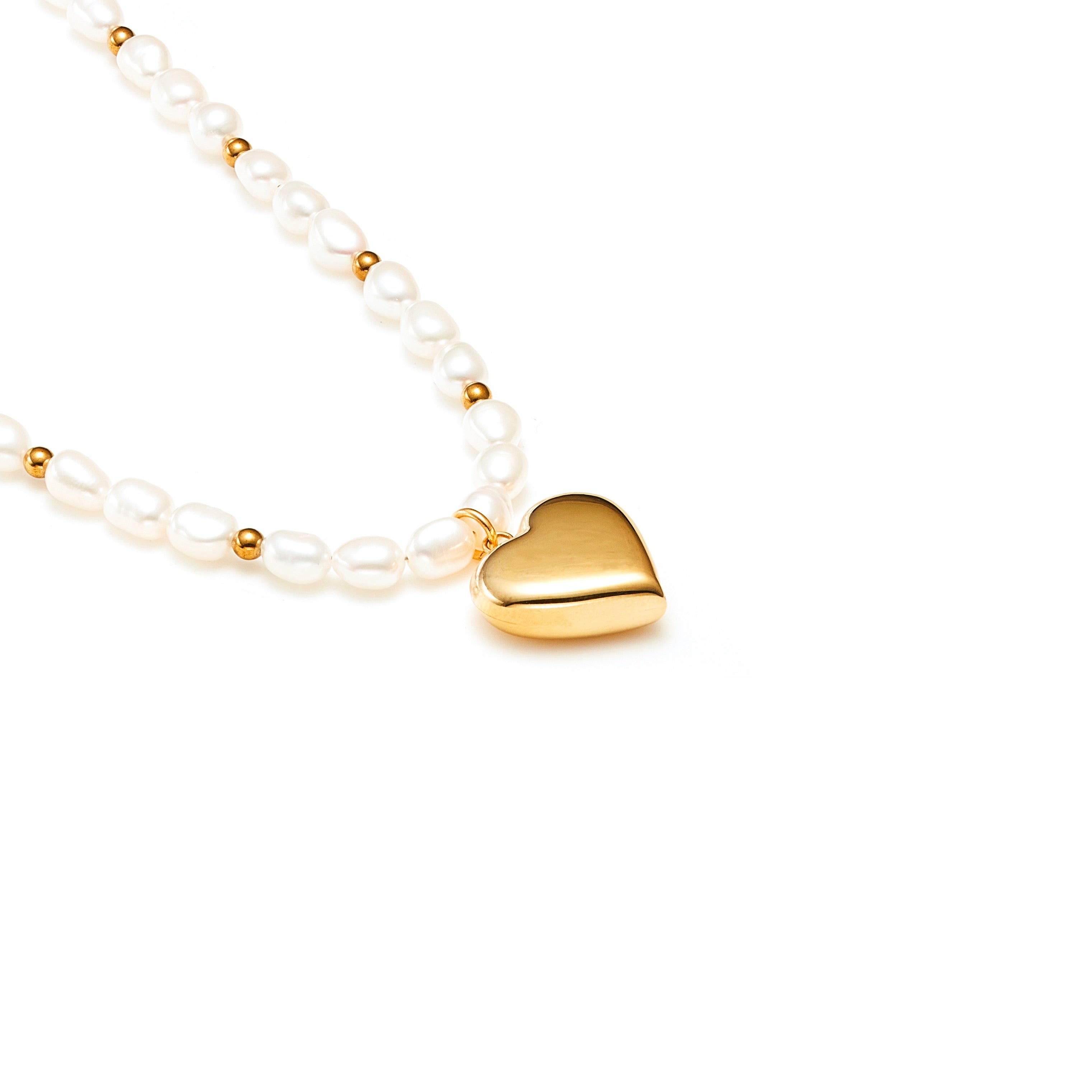 Pearl puffed heart necklace in 14k gold-plated stainless steel with freshwaters pearls and gold hematite beads.