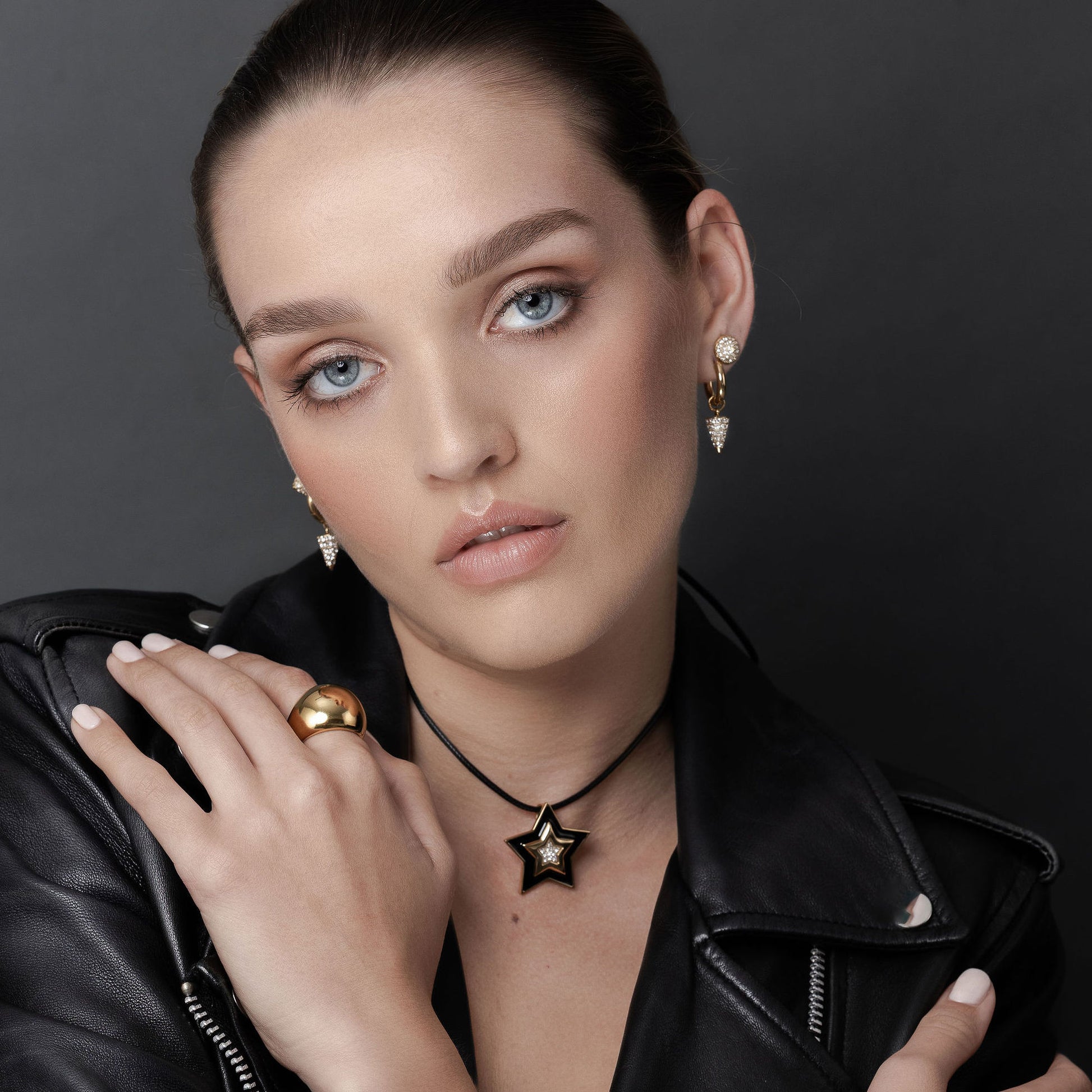 Linea Lariat Wax Black Cord Necklace with 14k gold-plated stainless steel Supernova Star Pendant