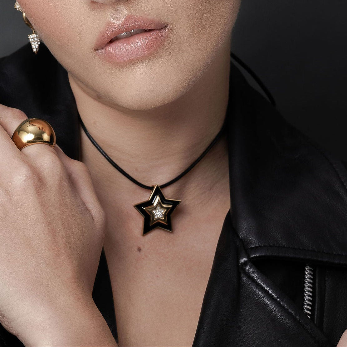 Linea Lariat Wax Black Cord Necklace with 14k gold-plated stainless steel Supernova Star Pendant