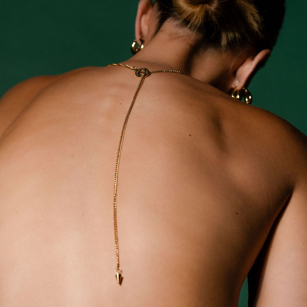 Silk & Steel Orbit Lariat necklace in 14k gold-plated stainless steel.