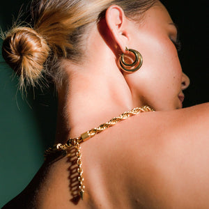 Silk & Steel large halo hoop earrings in 14k gold-plated stainless steel.