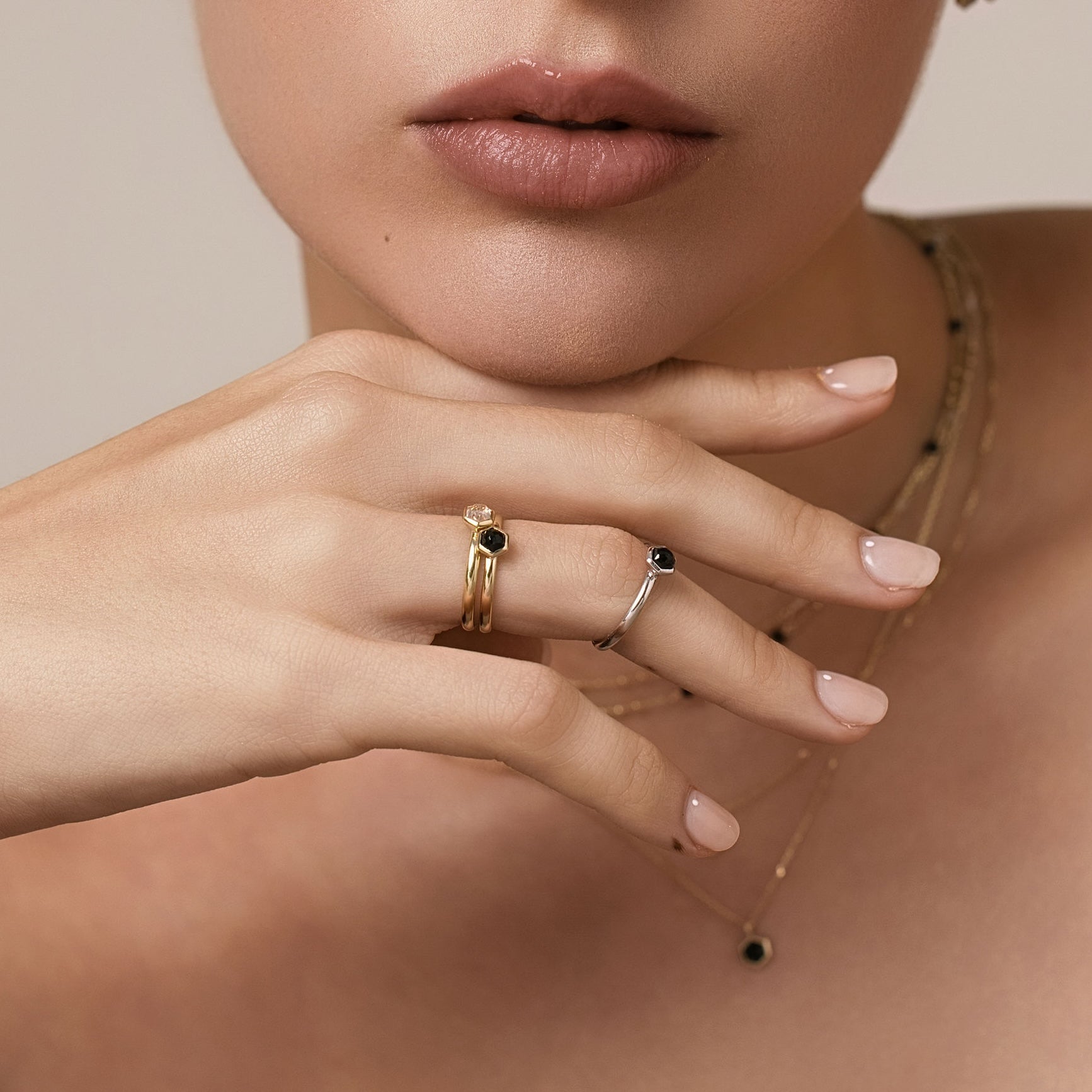 Silk & Steel Mini Harmony rings with natural crystal quartz and black spinel gemstones in 14k gold-plated sterling silver