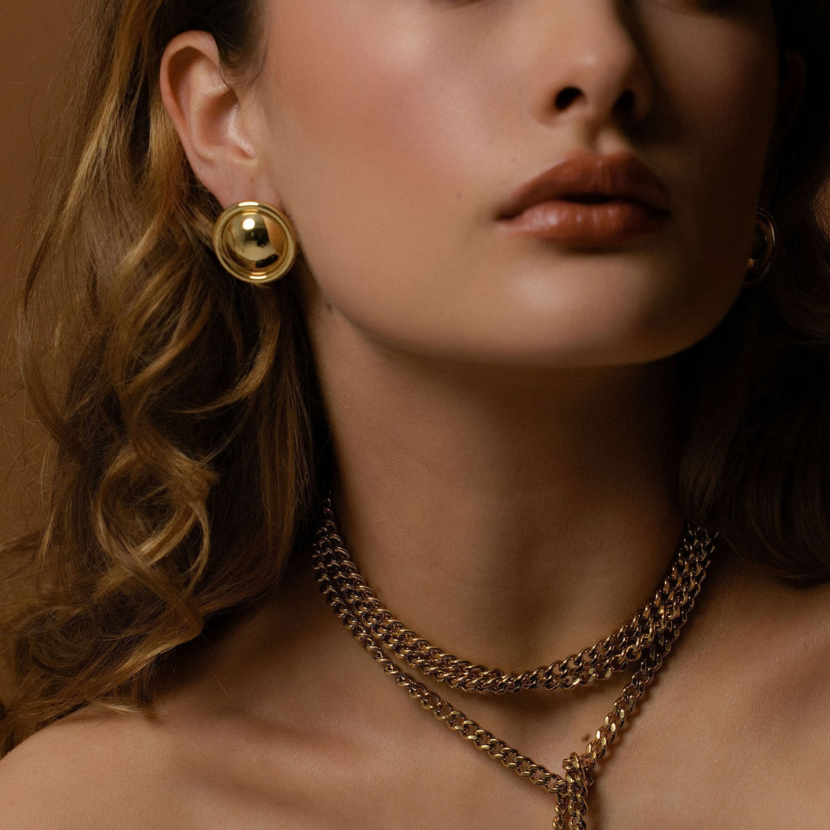 Silk & Steel Statement Globe Earrings in 14k gold-plated stainless steel. 