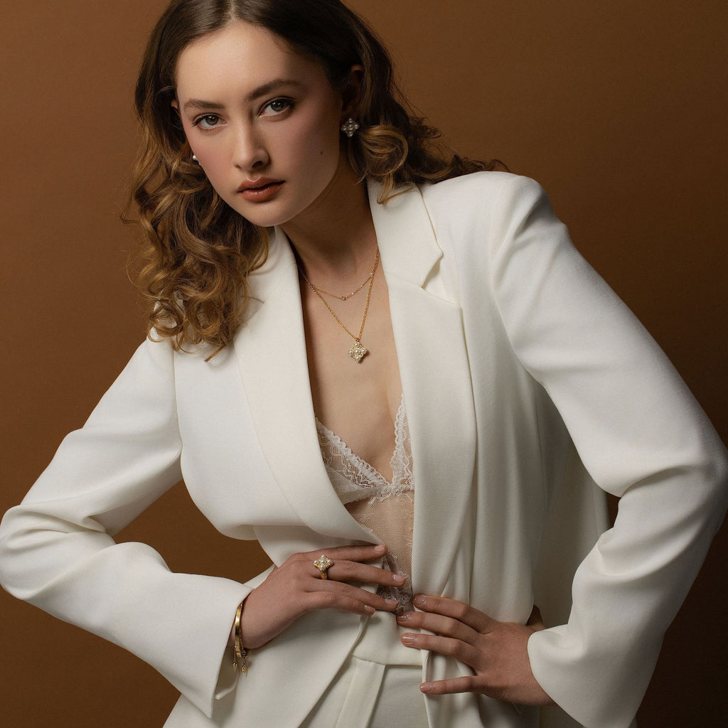 Silk & Steel Perla Ring and Perla Necklace in 14k gold-plated stainless steel with faux pearls and clear cubic zirconias.