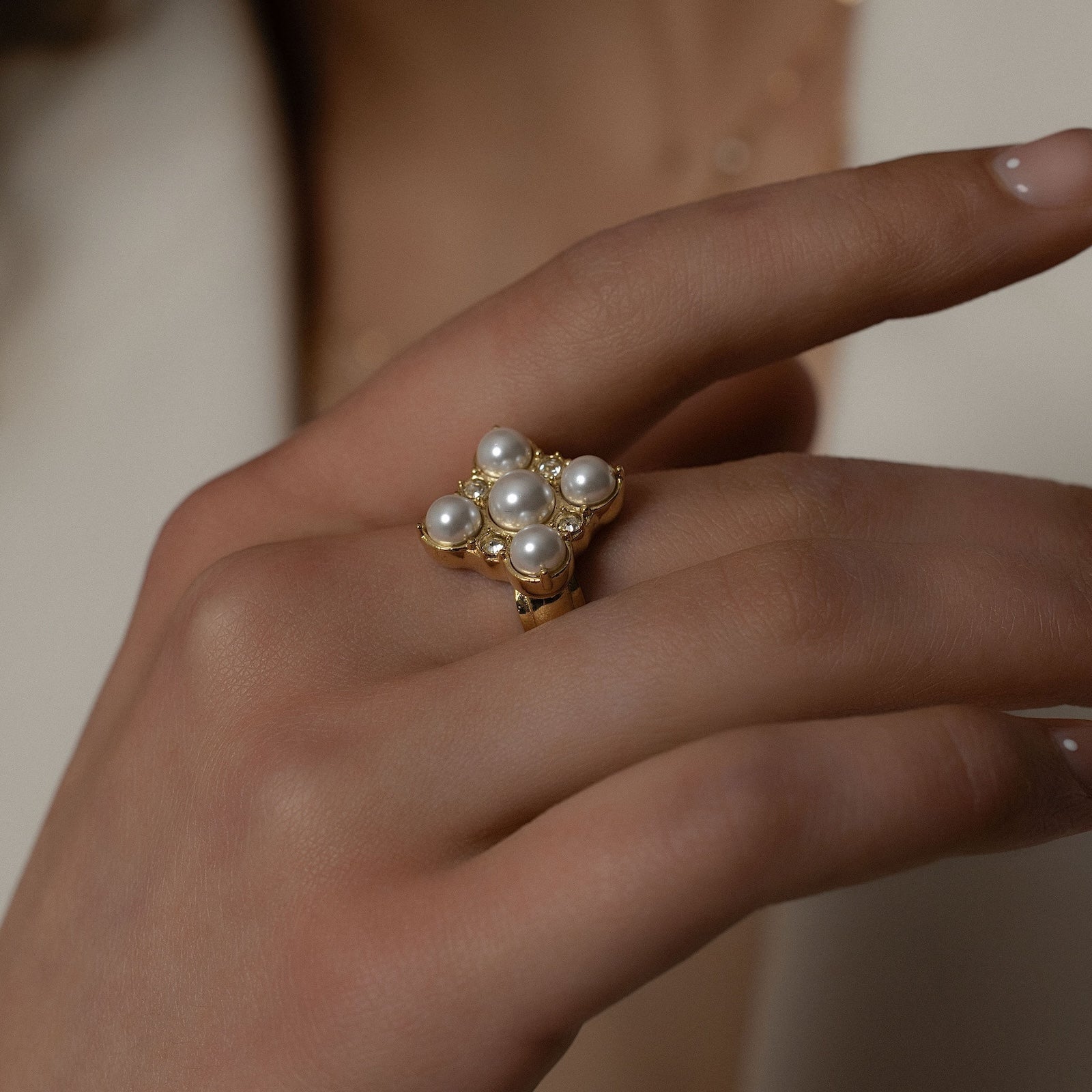 Silk & Steel Perla Ring in 14k gold-plated stainless steel with faux pearls and clear cubic zirconias.