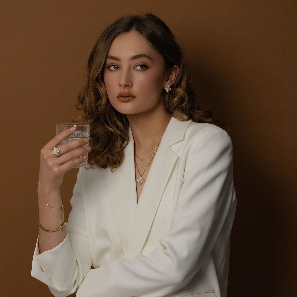 Silk & Steel Perla Ring , Necklace and Earrings in 14k gold-plated stainless steel with faux pearls and clear cubic zirconias.