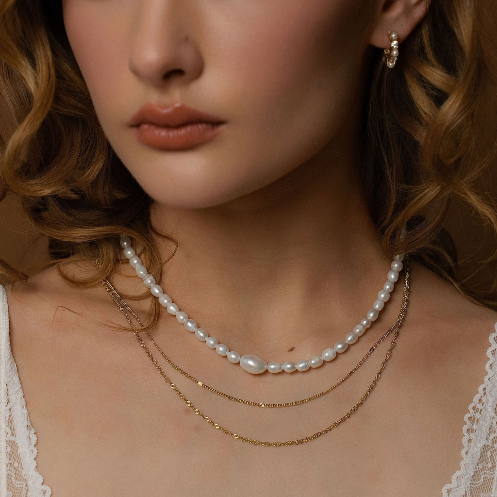 Silk & Steel Pearl necklace in 14k gold-plated stainless steel with freshwater pearls.