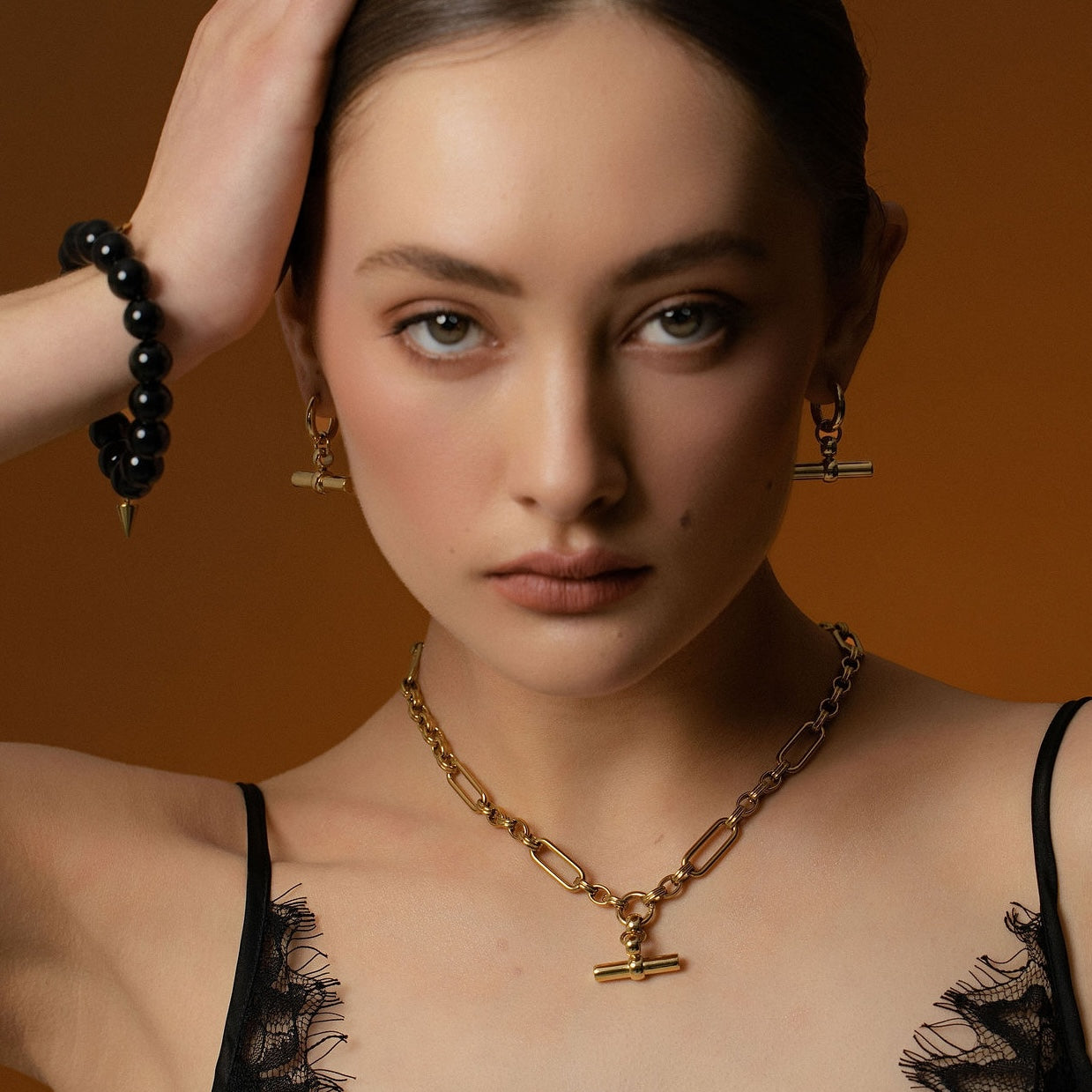 Silk & Steel Atlas hoops and necklace in 14k gold-plated stainless steel.