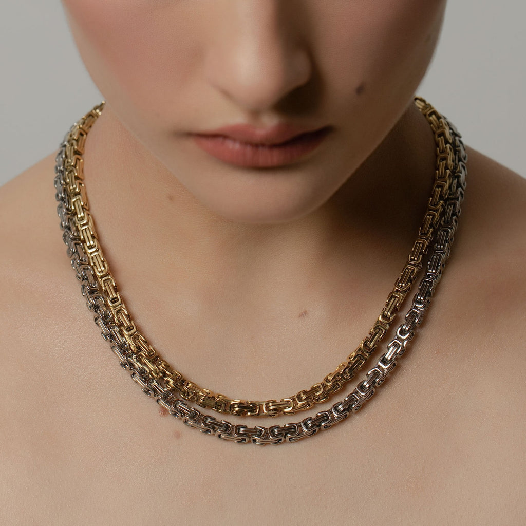 Silk & Steel Meridian Necklace in high polish silver and 14k gold-plated stainless steel.