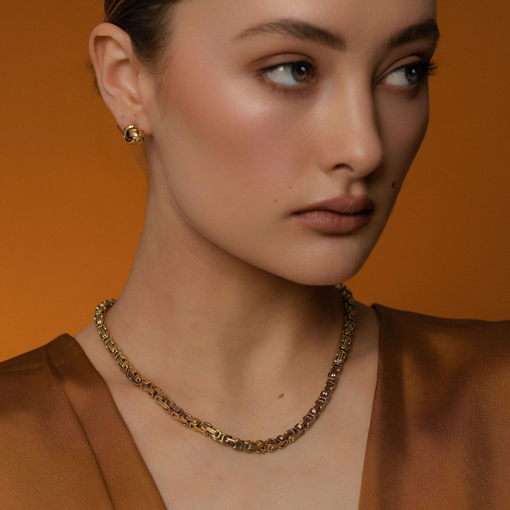 Model wears Silk & Steel Meridian Necklace with vintage chain in 14k gold-plated stainless steel.