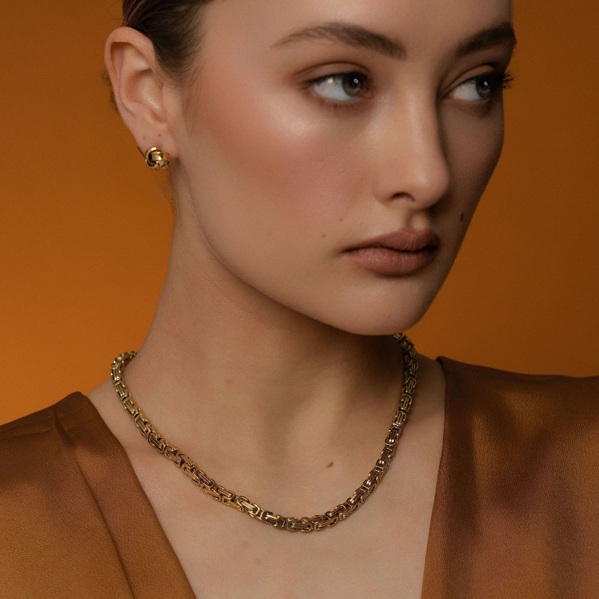 Model wears Silk & Steel Meridian Necklace with vintage chain in 14k gold-plated stainless steel.