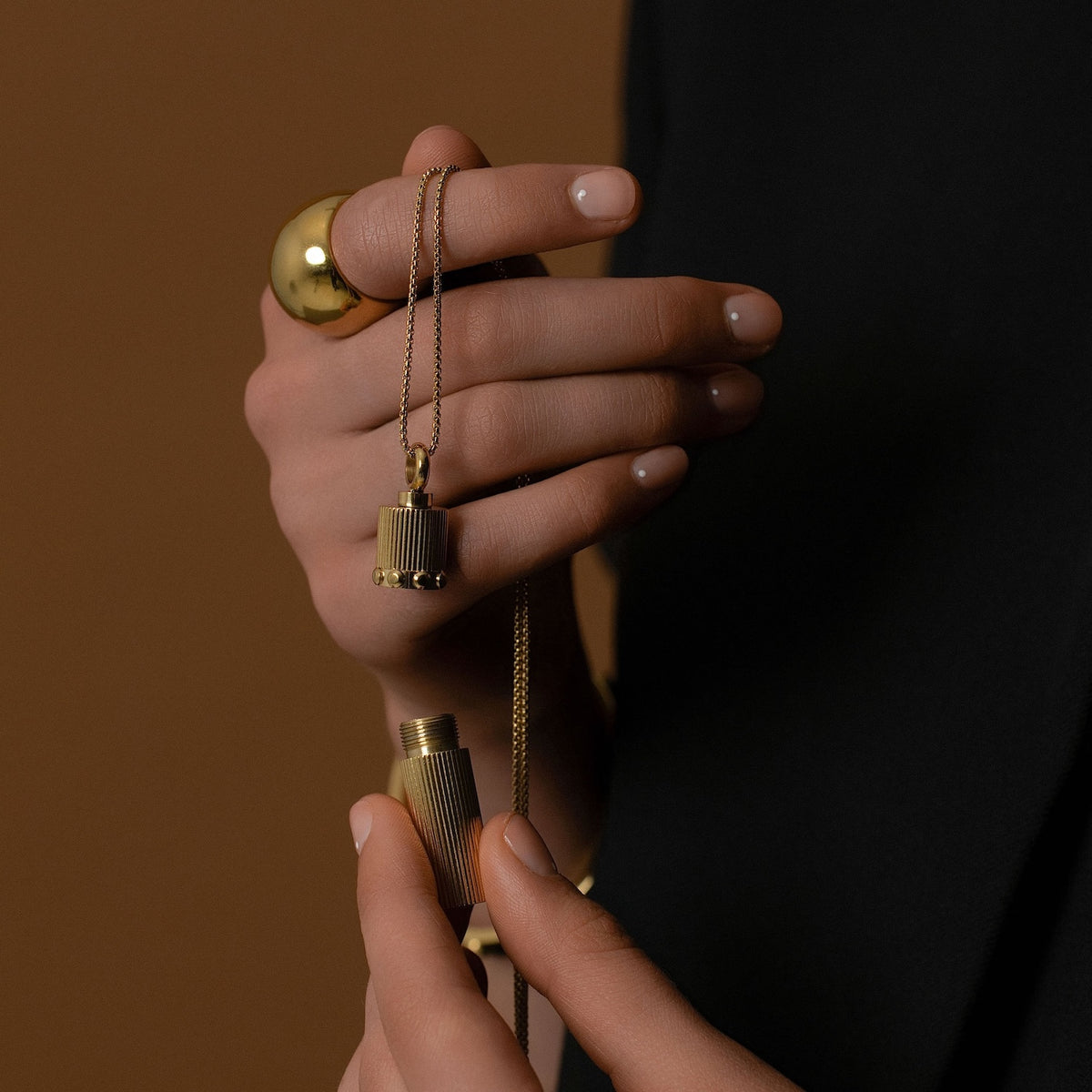 Silk & Steel Capsule Necklace in 14k gold-plated stainless steel.