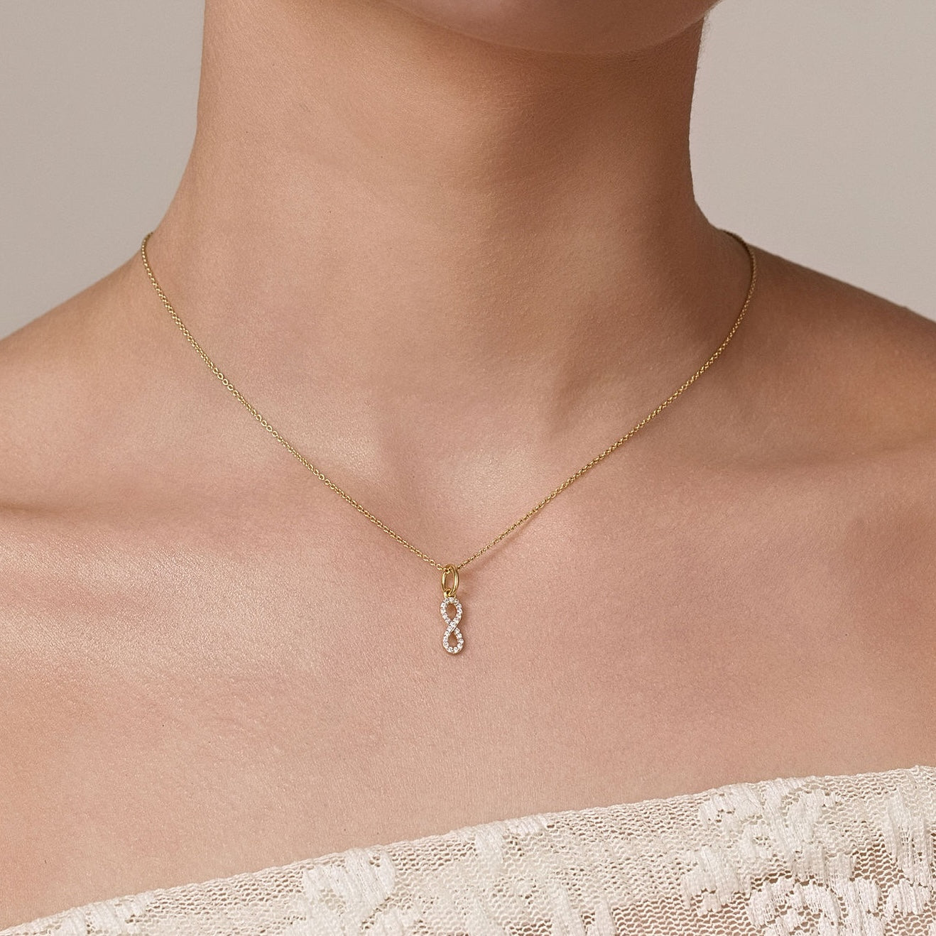 Silk & Steel Storyteller Infinity Necklace on fine cable chain in 14k gold-plated sterling silver with cubic zirconia.