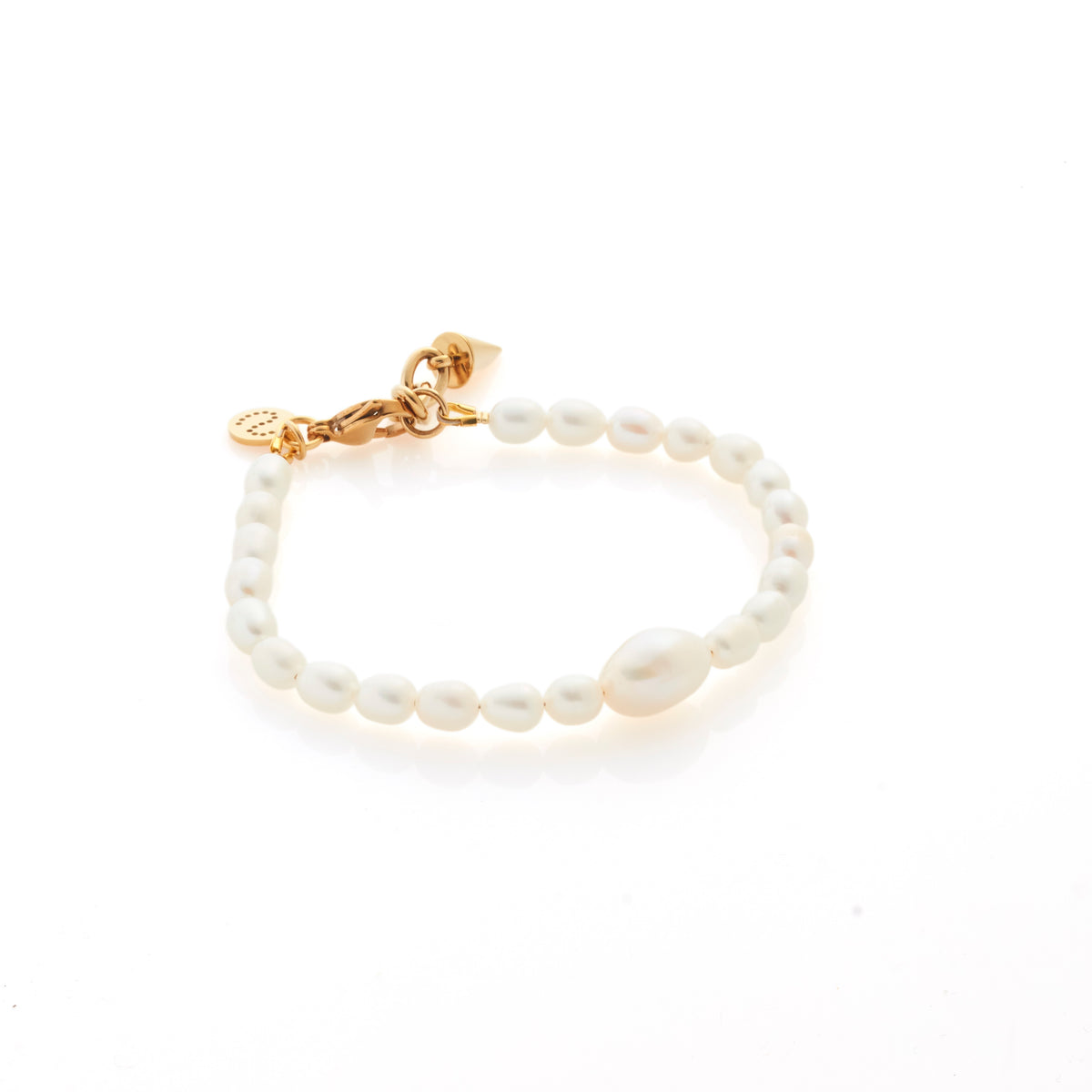 Silk & Steel Pearl Bracelet in 14k gold-plated stainless steel, hand strung with freshwater pearls.