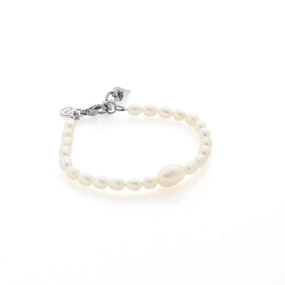 Silk & Steel Pearl Bracelet in  rhodium-plated stainless steel, hand strung with freshwater pearls.