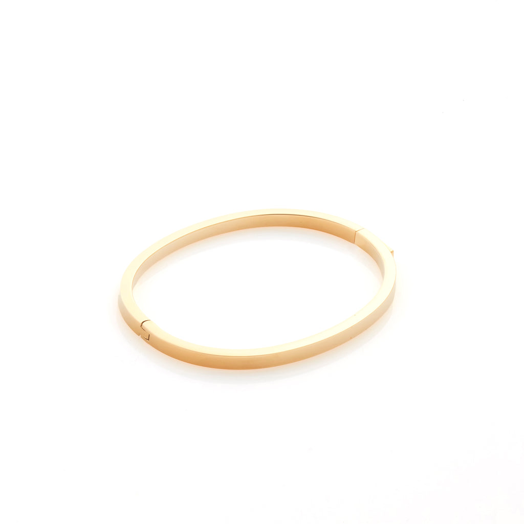 Silk & Steel Thin Voyage Bangle in 14k gold-plated stainless steel.