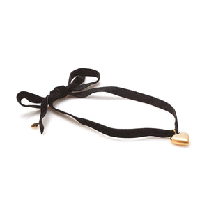 Silk & Steel cupid choker necklace in black velvet ribbon and puffed heart pendant in 14k gold-plated stainless steel.