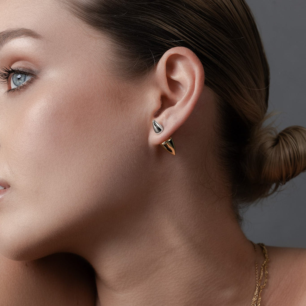 Sculptural two-tone double spike ear jacket earrings in 14k gold-plated and silver stainless steel