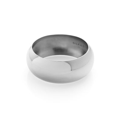 Silk & Steel Globe Cuff wide bangle in premium high-polished stainless steel.