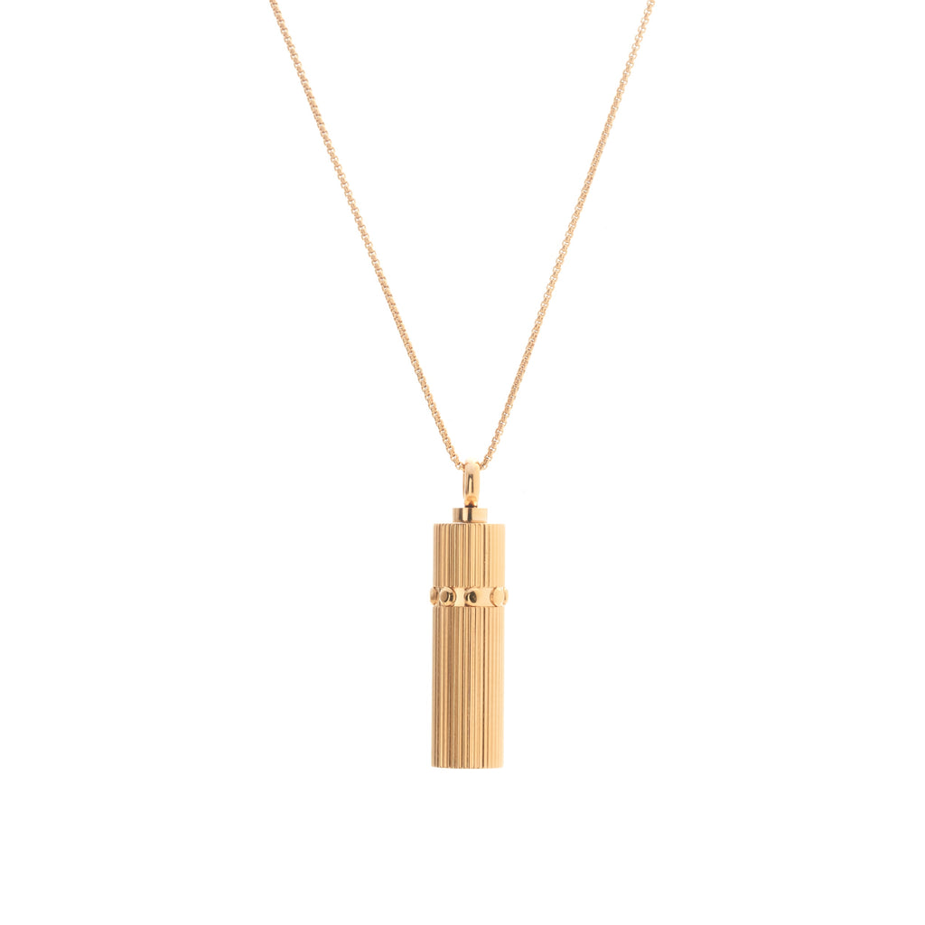 Silk & Steel Capsule Necklace featuring a 14k gold-plated stainless steel keepsake capsule pendant.