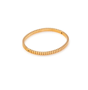 Silk & Steel Oracle bangle in 14k gold-plated stainless steel.