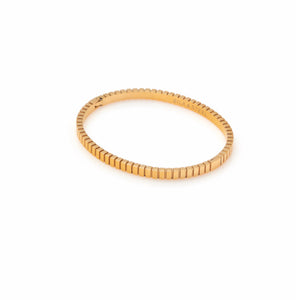 Silk & Steel Oracle bangle in 14k gold-plated stainless steel.